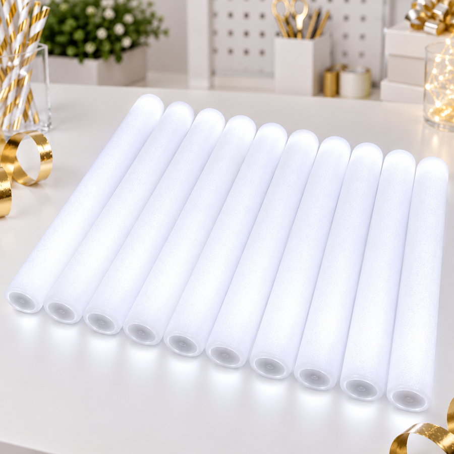 All white personalized glow sticks in a bright studio